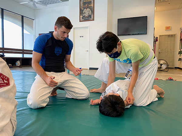 child learning jiu-jitsu at Gracie Jiu-Jitsu Indio